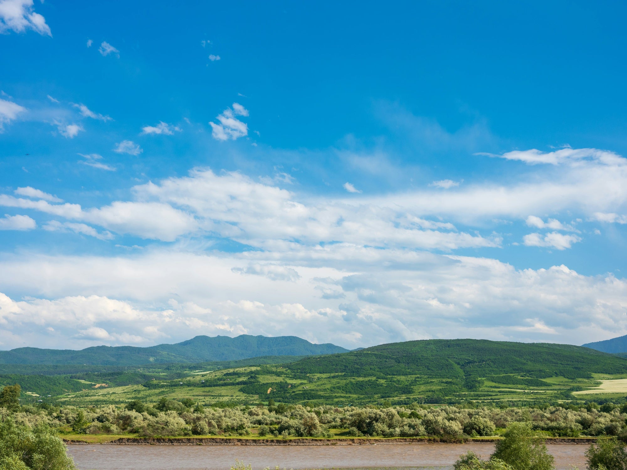 Georgia mountain landscape with green hills and valleys — FDM Enterprises MRI and CT scanner service coverage across Georgia