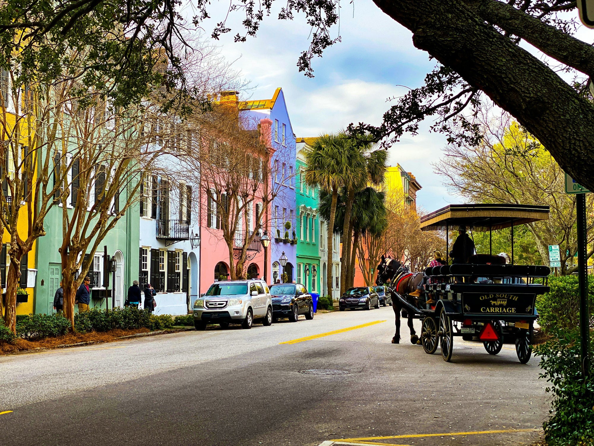 Colorful Rainbow Row houses and horse-drawn carriage in Charleston South Carolina — FDM Enterprises MRI and CT service coverage across South Carolina