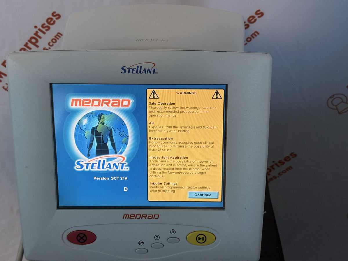 Medrad Stellant CT injector display control unit powered on, showing the SCT 21A startup warnings screen