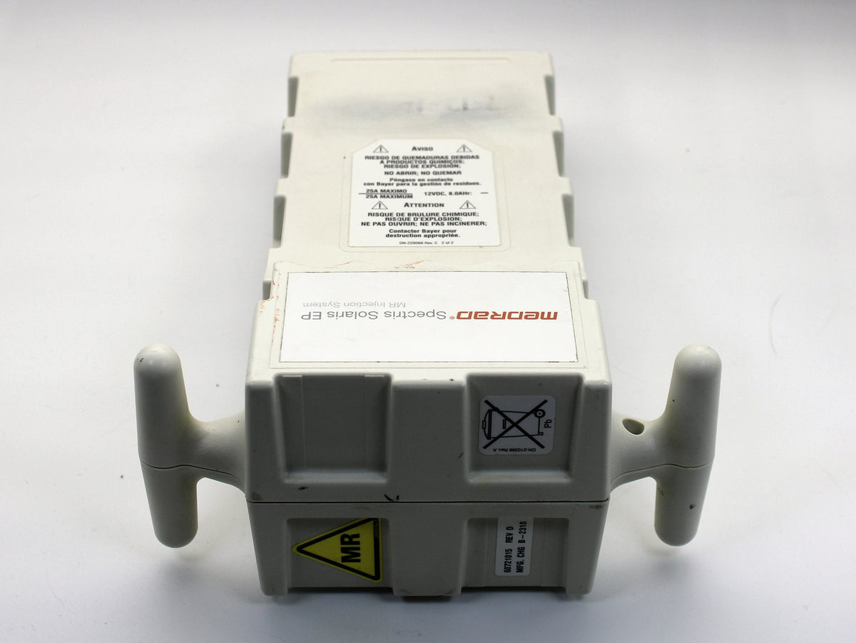 Back of the Spectris Solaris battery pack with the 12 VDC 8.0 Ah rating and warning labels