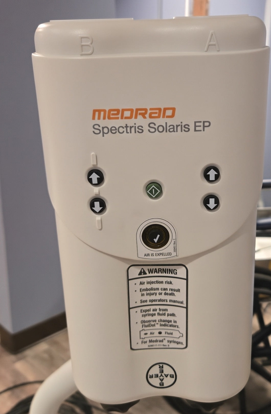 Medrad Spectris Solaris EP MRI contrast injector head, front view showing the A and B syringe controls and air-expelled indicator